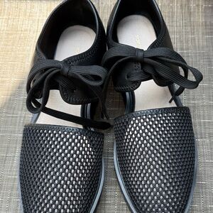 Black Flats with Mesh Design and Synthetic Leather